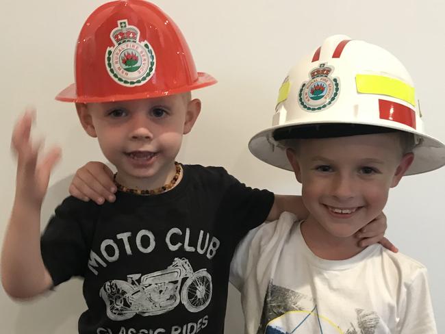 Volunteer firefighters in the making. Toby and Hayden Duff, sons of Peter Duff, captain of Terrey Hills RFS. Picture: Supplied.