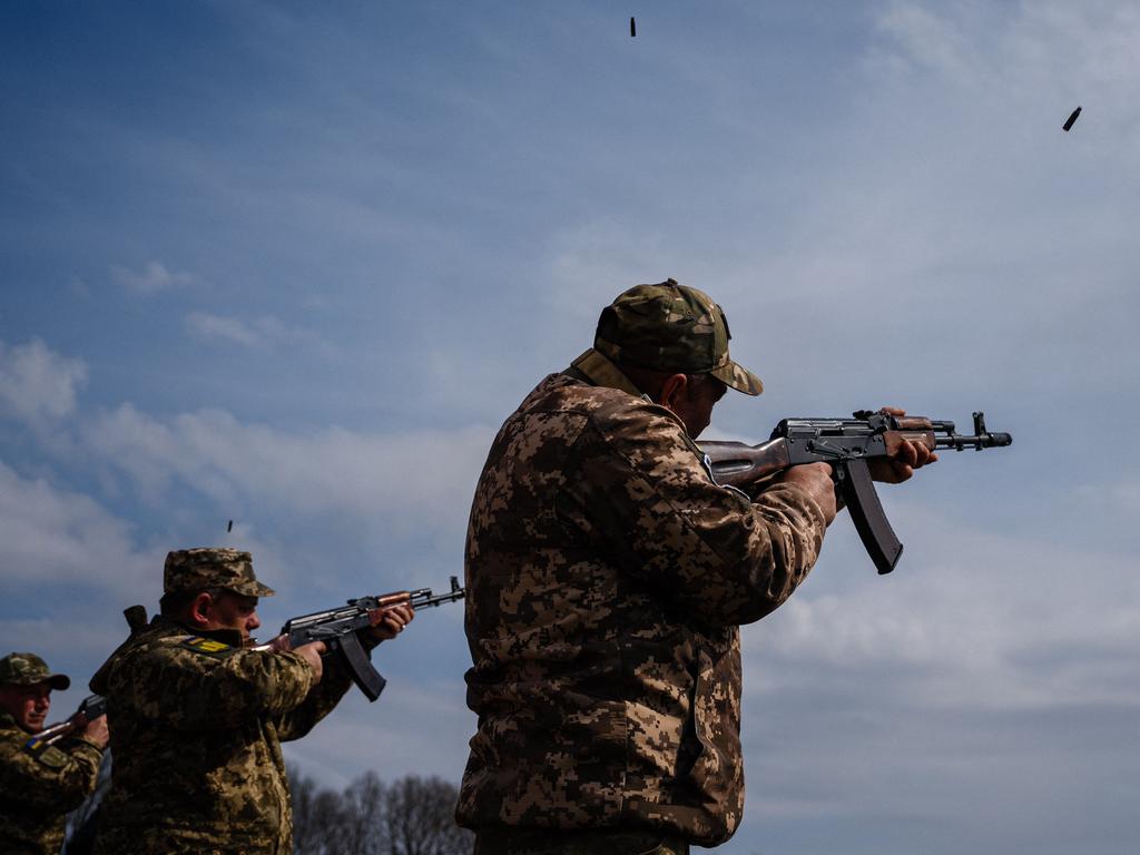 Ukrainian soldiers during a funeral ceremony in Brovary. Picture: Dimitar Dilkoff/AFP