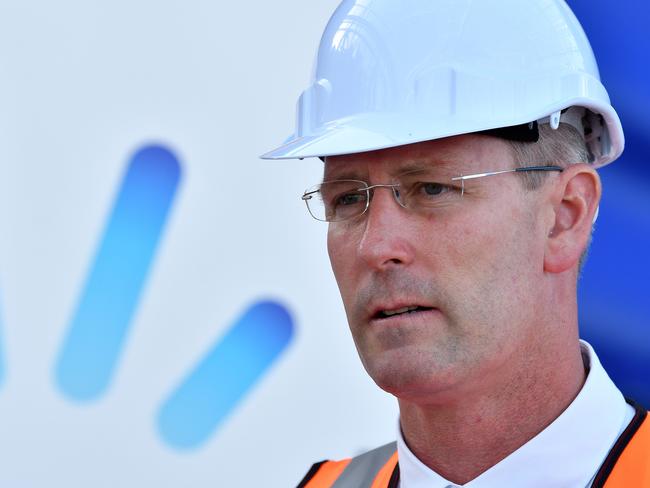 SA Energy Minister, Dan van Holst Pellekaan speaks to media in front of the first of twelve engines delivered to the new Barker Inlet Pwer Station Monday March ,4,2019.(Image AAP/Mark Brake)