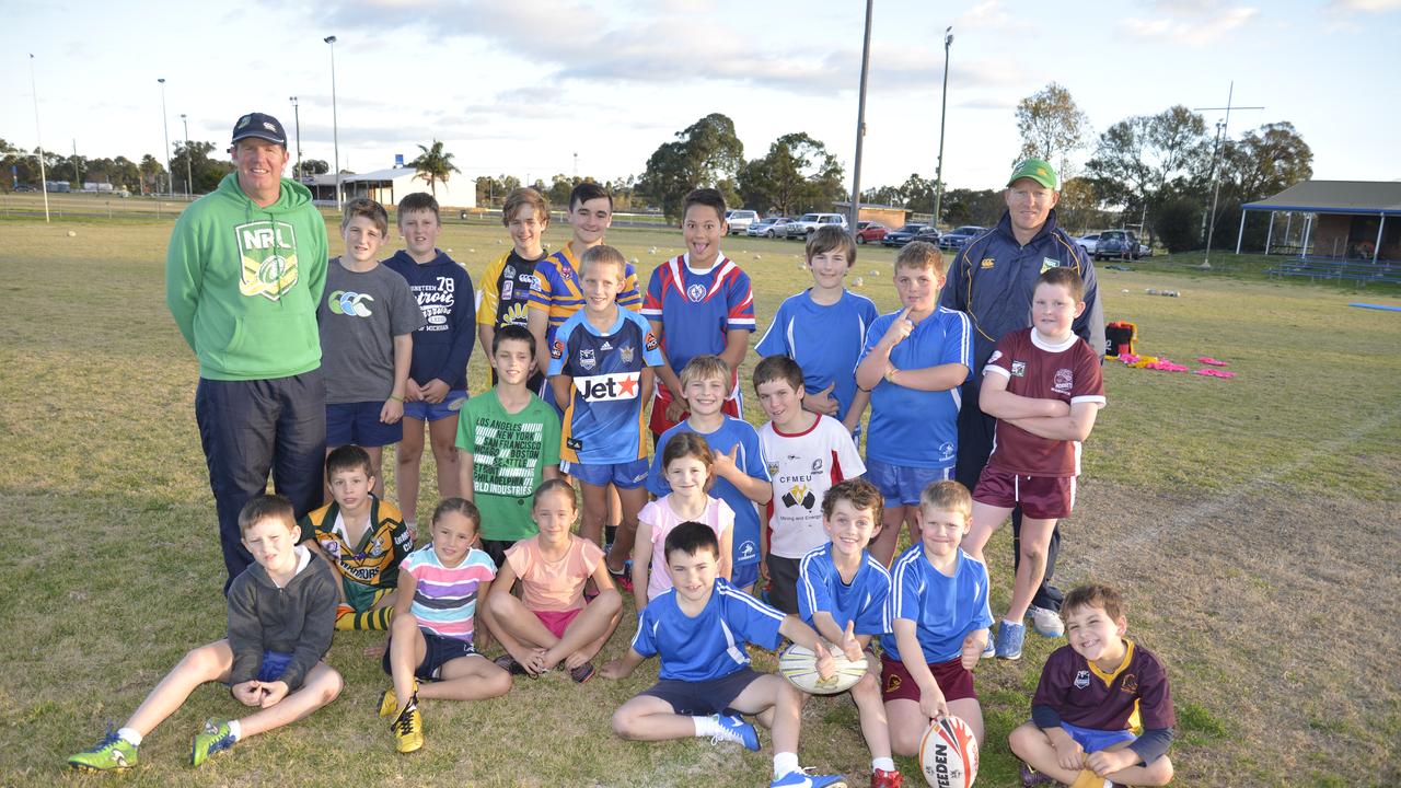 NRL development officers Lennie Currie and Scott Zahra with participants at a rugby league coachinc clinic at Collegians Oval on Tuesday. Photo Gerard Walsh / Warwick Daily News