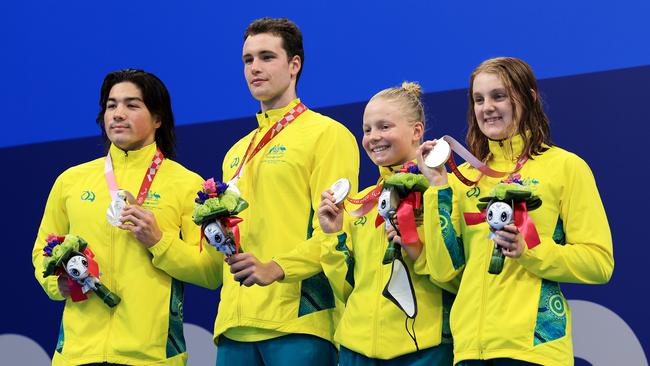 Silver medallists Ricky Betar, Benjamin James Hance, Ruby Storm and Madeleine McTernan celebrate winning silver in the mixed 4x100m Freestyle Relay – S14 Final. Picture: Buda Mendes/Getty Images