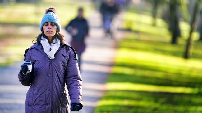 People are already rugging up in places like Melbourne as the cold weather continues. Picture: NewsWire / Luis Enrique Ascui