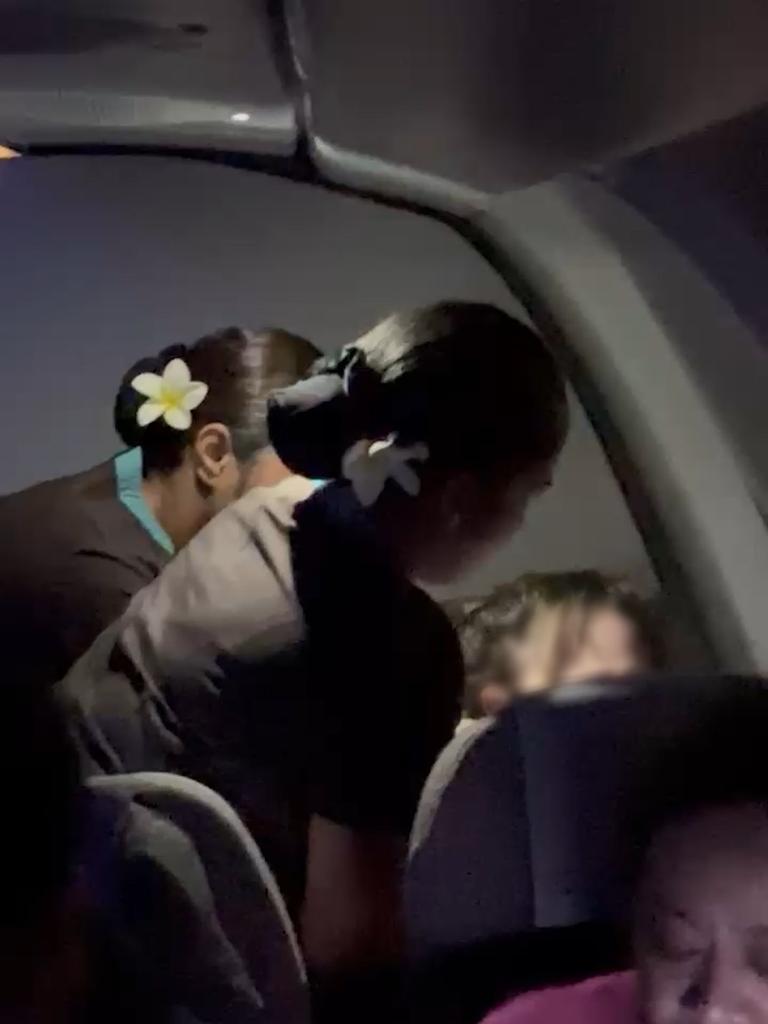 The woman was heard screaming and resisting as cabin crew attempted to use duct tape.