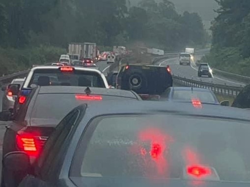 A caravan jackknifed in rainy conditions on the Bruce Highway near Woombye, causing significant traffic delays on Sunday afternoon. Photo: Lara Nunn