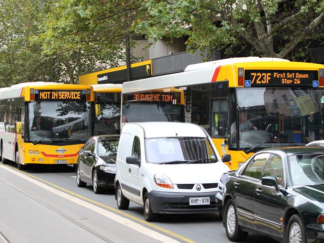 Public transport - Adelaide Metro bus during a ''dead running'' or Ghost run through King William Street, Adelaide. Buses running with a 'not in service' sign are usually travelling between routes.