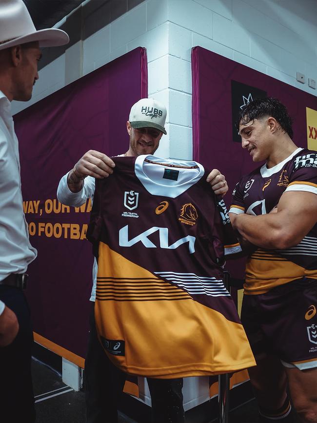 Tyler Hubbard was gifted his very own Broncos jersey by players Corey Oates and Kotoni Staggs earlier this year. Photo: Instagram/@brisbanebroncos