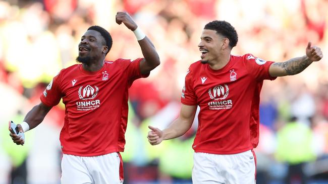 Serge Aurier and Morgan Gibbs-White of Nottingham Forest celebrate after the team's victory, which confirms their place in the Premier League for the next season. Picture: Catherine Ivill/Getty Images