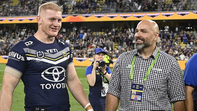 Cowboys coach Todd Payten celebrates with Griffin Neame. (Photo by Ian Hitchcock/Getty Images)