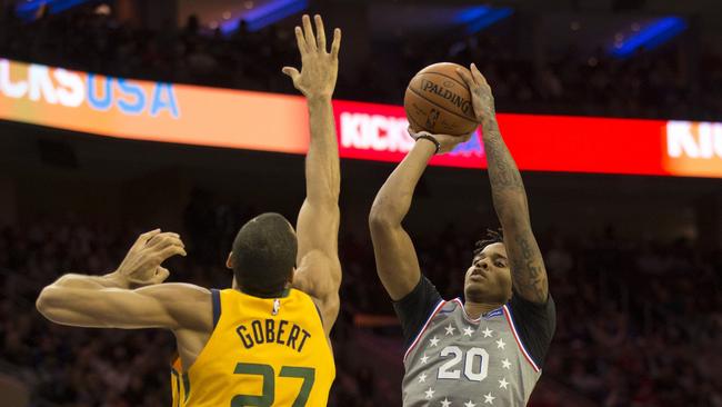 Markelle Fultz shoots the ball against Rudy Gobert. Picture: Mitchell Leff/Getty Images/AFP