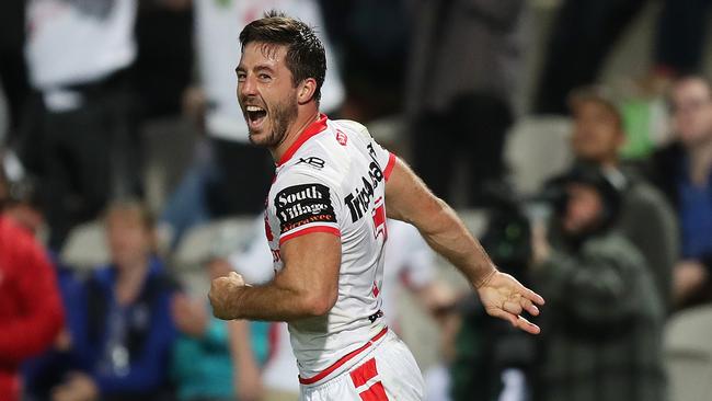 Ben Hunt celebrates after scoring his second try for the Dragons. Picture: Brett Costello