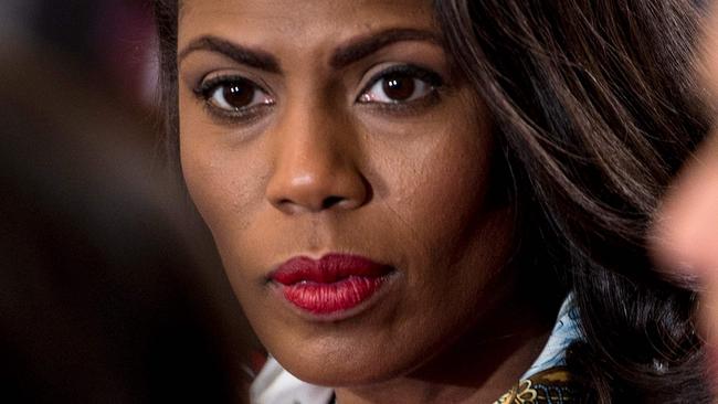 (FILES) In this file photo taken on October 26, 2017 Omarosa Manigault, White House Director of Communications for the Office of Public Liaison, waits to hear the US President speak on combatting drug demand and the opioid crisis in the East Room of the White House in Washington, DC. Former reality TV star Omarosa Manigault Newman is releasing a book next month containing an "explosive" account of her brief tenure in Donald Trump's White House, her publisher said on July 26, 2018. / AFP PHOTO / Brendan Smialowski