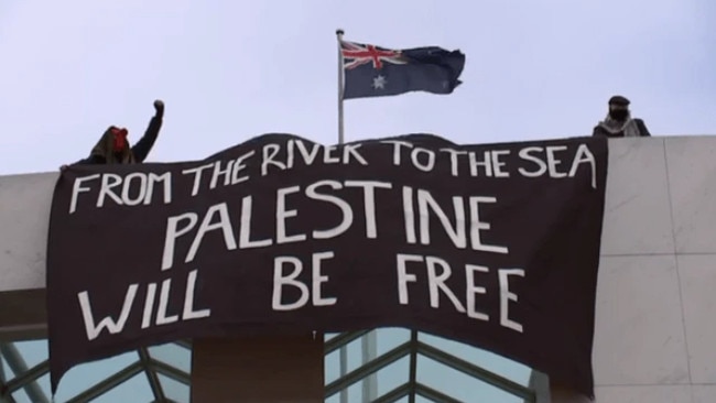 Pro-Palestinian protesters have climbed on the roof of Parliament House in Canberra today to protest the war in Gaza. Picture: Sky News