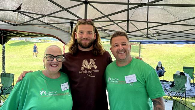 Left to right: Susie Longman, Patrick Carrigan, Cameron Christie. Gold Coast community Christmas lunch 2024. Photo: Jacklyn O'Brien.