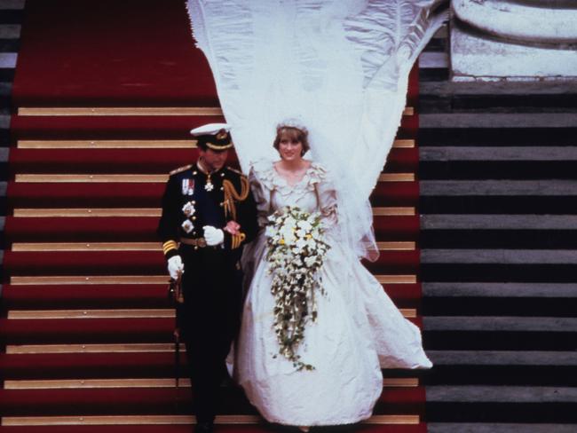 Prince Charles, Prince of Wales and Diana, Princess of Wales, wearing a wedding dress designed by David and Elizabeth Emanuel and the Spencer family Tiara, leave St. Paul's Cathedral following their wedding on July 29, 1981 in London, England. Picture: Getty Images
