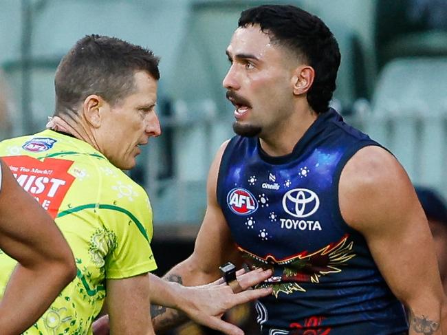 MELBOURNE, AUSTRALIA - MAY 18: Izak Rankine of the Crows disputes an umpiring decision in the dying seconds during the 2024 AFL Round 10 match between The Collingwood Magpies and Kuwarna (Adelaide Crows) at The Melbourne Cricket Ground on May 18, 2024 in Melbourne, Australia. (Photo by Dylan Burns/AFL Photos via Getty Images)