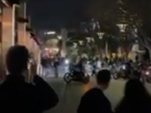 A gang of bikies are being investigated after they were caught parading through the streets of Melbourne late on Friday night.