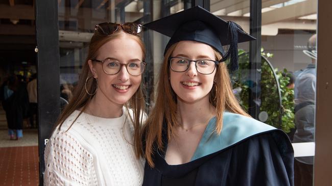 Laura and Emily Glennon celebrate graduation. Picture: Brad Fleet