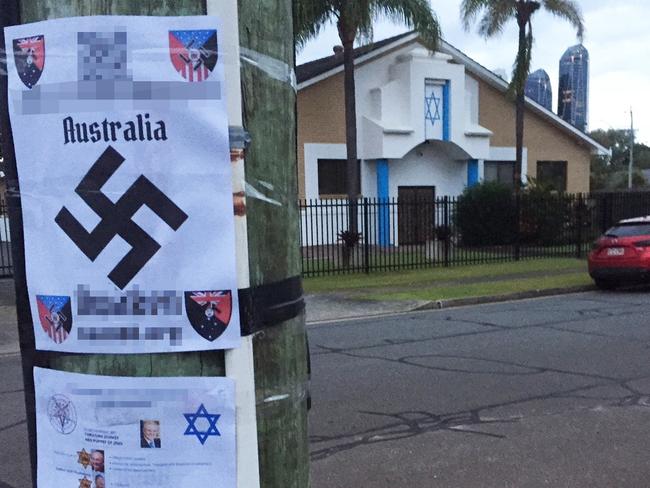 Anti-Semitic flyers taped to a pole outside the Temple Shalom on Isle of Capri on the Gold Coast.