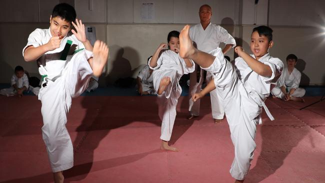 Students Jason Nghiem 11, Amy Le 11, instructor Chung Dang and David Le 10. Picture: Chris Pavlich