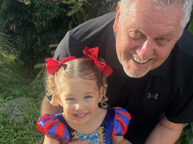 WEEKEND TELEGRAPH. Supplied image of Ray Hadley with his granddaughter Lola, 3, who is currently undergoing treatment for Leukemia. Pic Supplied.