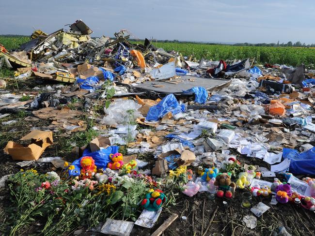 Flowers at the crash site of a Malaysia Airlines plane where 298 people died. Picture: AFP