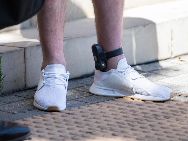 ADELAIDE/ KAURNA YARTA, AUSTRALIA - NewsWire Photos FEBRUARY 13, 2024: Ankle bracelets for electronic monitoring by police are seen being worn outside of Adelaide Magistrates Court. Picture: NCA NewsWire / Morgan Sette