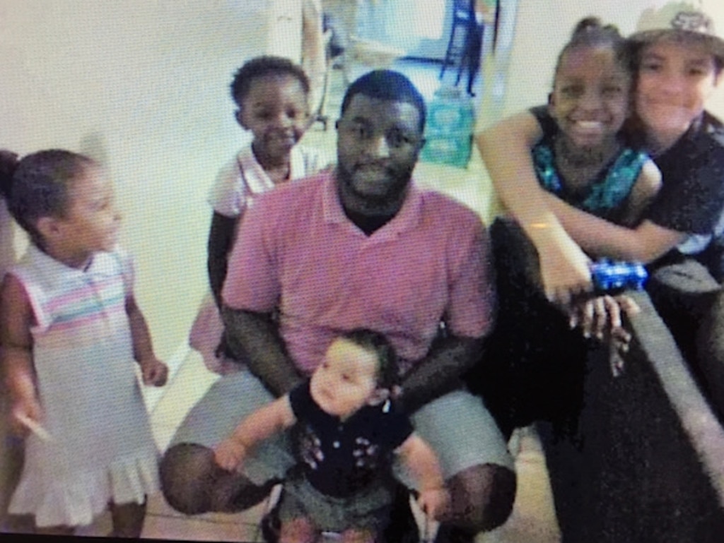 Germayne with his children. Sanaa is standing just by his shoulder. Picture: supplied by family