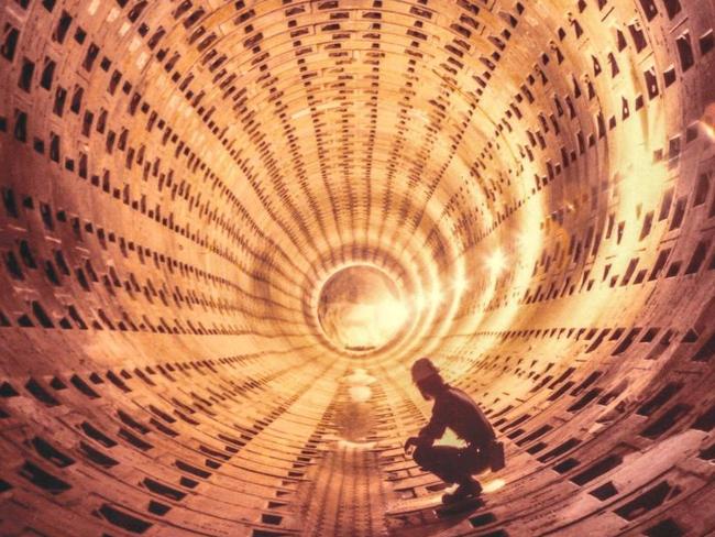 Before the tracks: a worker crouches in the loop in 1978. Picture: PROV.