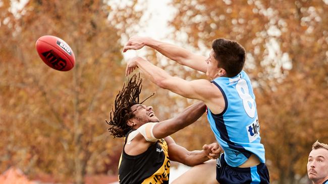 Glenelg's Neil Vea Vea battles Sturt's Jack Stephens on Saturday. Picture: AAP/Matt Loxton.