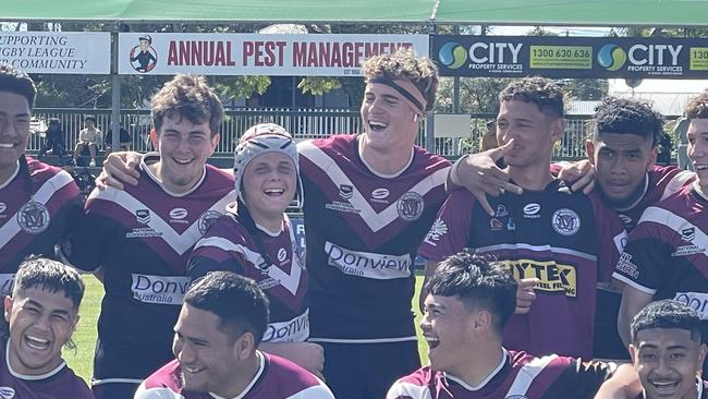 Marsden SHS's best player in the semi-final, Cory Pearse, white head gear, with mates.