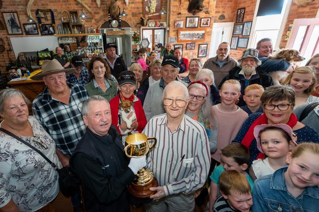 The trophy and John Letts visit former jockey Brian Dowker at Rushworth’s Criterion Hotel in Victoria.