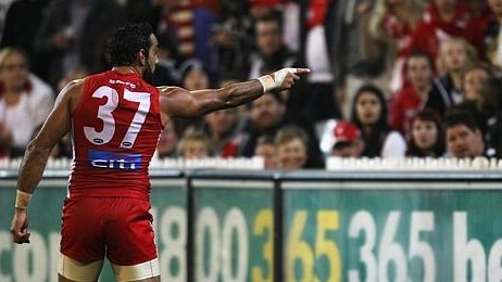 Adam Goodes points out a fan after being subjected to a racist taunt at the MCG. Picture: Andrew White