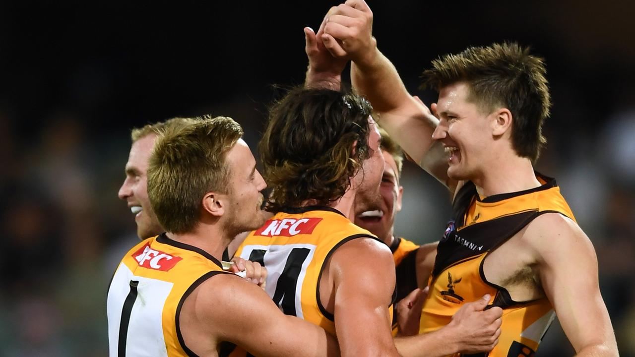 Mitch Lewis celebrates a goal with Harry Morrison and Jai Newcombe. Picture: Getty Images