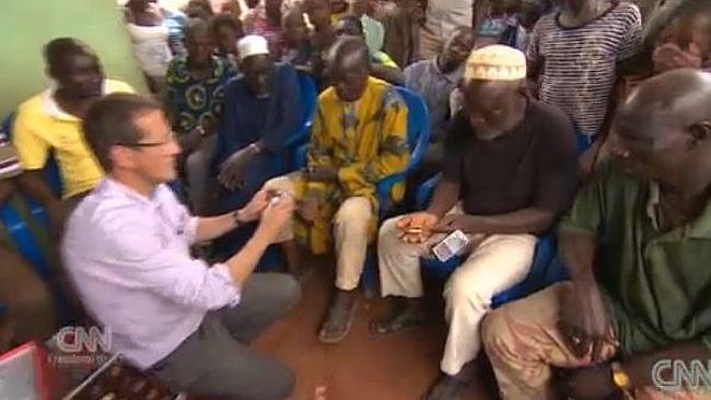 Elders get first taste of the chocolates. Pic: Screengrab CNN.