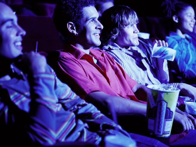 The good old days of cinema-going: friends, popcorn, intense focus.