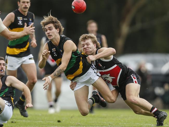 Brayden Chapple (right) tackles his Dromana opponent.