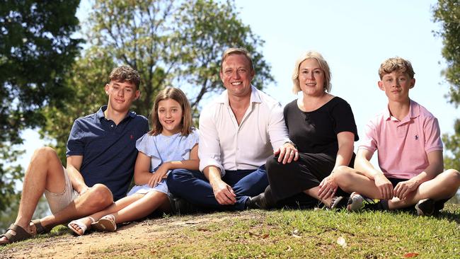 Premier Steven Miles, pictured at home with his family, owns four properties with his wife Kim. Picture: Adam Head
