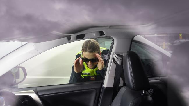 Officers from the Frontline Tactical unit and Proactive Policing units in the carpark at Fountain Gate in Narre Warren. Casey and Dandenong are hot spots for vehicle crime. Acting Sgt Cath Llewelyn was checking cars. PICTURE: PENNY STEPHENS. THURSDAY 20TH FEBRUARY 2020