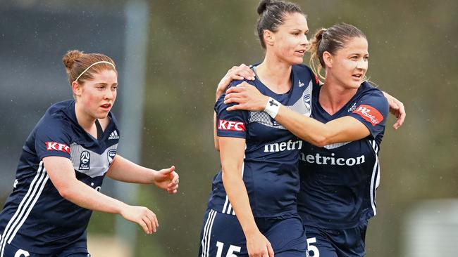  Emily Gielnik and Laura Alleway celebrate after Natasha Dowie of the Victory scored the first goal during the round five W-League match between the Melbourne Victory and the Western Sydney Wanderers.