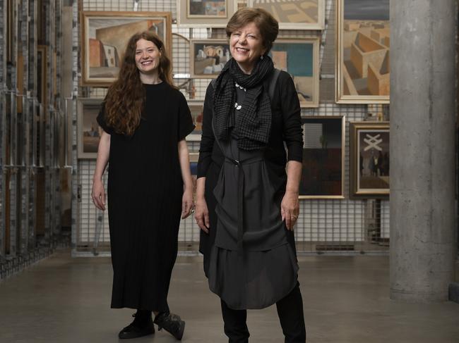 Co-curators (L to R) Rebecca Edwards and Deborah Hart prepare for the December 11 launch of the Jeffrey Smart exhibition at the National Gallery of Australia.