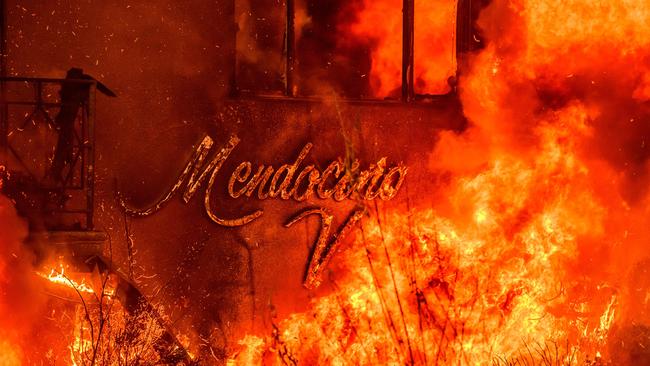 An apartment building burns during the Eaton fire in the Altadena area of Los Angeles. Picture: AFP.