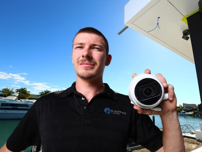 Jacob Nicholson from Electronic Living installing security cameras at a property in Cleveland. Friday 28th July 2023 Picture David Clark