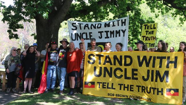 Supporters standing with Uncle Jim Everett following his release from police custody after being arrested for trespass in a Central Highlands logging coupe. Picture: Elise Kaine