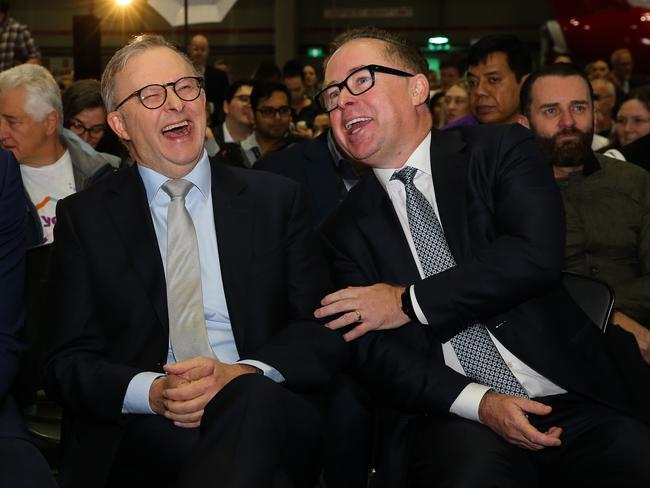 SYDNEY, AUSTRALIA  - AUGUST 14 2023: Former Australian rules football player  Adam Goodes, Prime Minister, Anthony Albanese and Qantas CEO Alan Joyce attend the launch of the Qantas 'Yes' Campaign where The Prime Minister will deliver a speech. Picture: NCA Newswire / Gaye Gerard