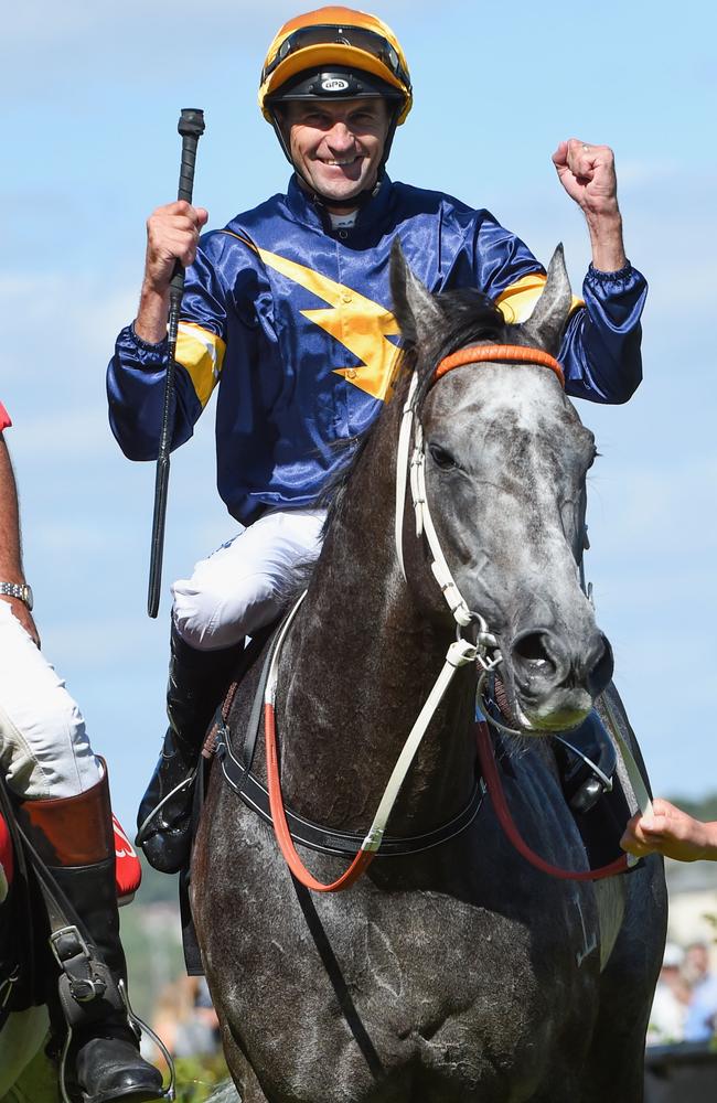 Dwayne Dunn celebrates another Chautauqua victory down the Flemington straight. Picture: Getty Images