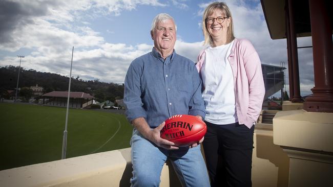 SFL president Russell Young (left), pictured with Sally Donnelly, is hopeful limits of crowd access to venues will be lifted to allow the league to begin. Picture: LUKE BOWDEN