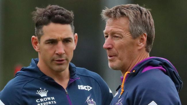 MELBOURNE, AUSTRALIA - MAY 16:  Billy Slater of the Melbourne Storm and Storm coach Craig Bellamy talk during a Melbourne Storm NRL media session at Gosch's Paddock on May 16, 2018 in Melbourne, Australia.  (Photo by Scott Barbour/Getty Images)