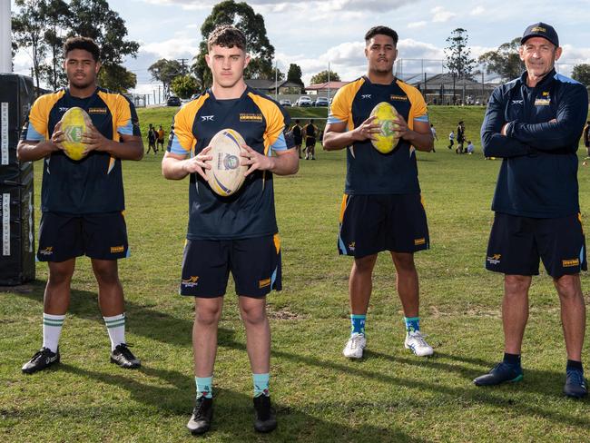 L-R Solomone Saukuru prop backrow centre fullback, Joseph O'Neill five -eighth, Apisalome Saukuru prop-backrow & coach Wayne Lambkin pose for a photo during training at Westfield Sports High School Fairfield West  on Thursday, 30 July 2020. Westfield Sports High rugby league school producing NRL champions.( Image / Monique Harmer)