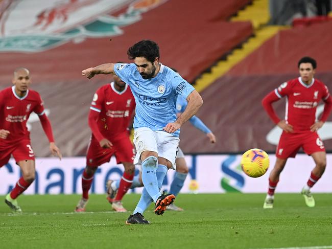 LIVERPOOL, ENGLAND - FEBRUARY 07: Ilkay Gundogan of Manchester City misses a penalty during the Premier League match between Liverpool and Manchester City at Anfield on February 07, 2021 in Liverpool, England. Sporting stadiums around the UK remain under strict restrictions due to the Coronavirus Pandemic as Government social distancing laws prohibit fans inside venues resulting in games being played behind closed doors. (Photo by Laurence Griffiths/Getty Images)