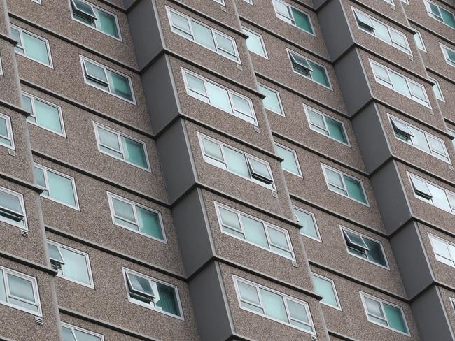 Police continue to monitor a lockdown at the Government housing towers in Racecourse Rd at Flemington. General view of one of the towers. Monday, July 6, 2020. Picture: David Crosling